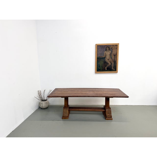 Maison lecan presents this exceptional 1950s dining table, inspired by brutalist and modernist design, imported from bali...