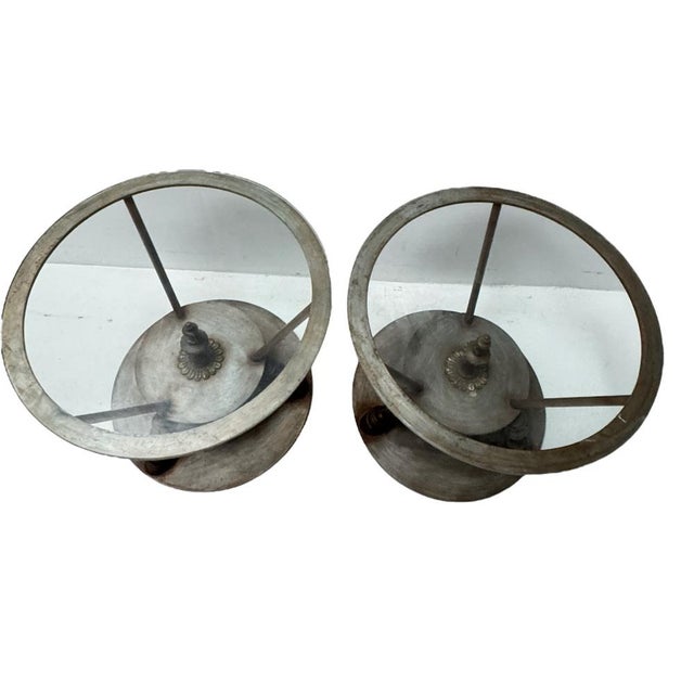 Stunning and elegant pair of Hollywood Regency center tables. Striking French design from the 1980s. Patinated metal and...