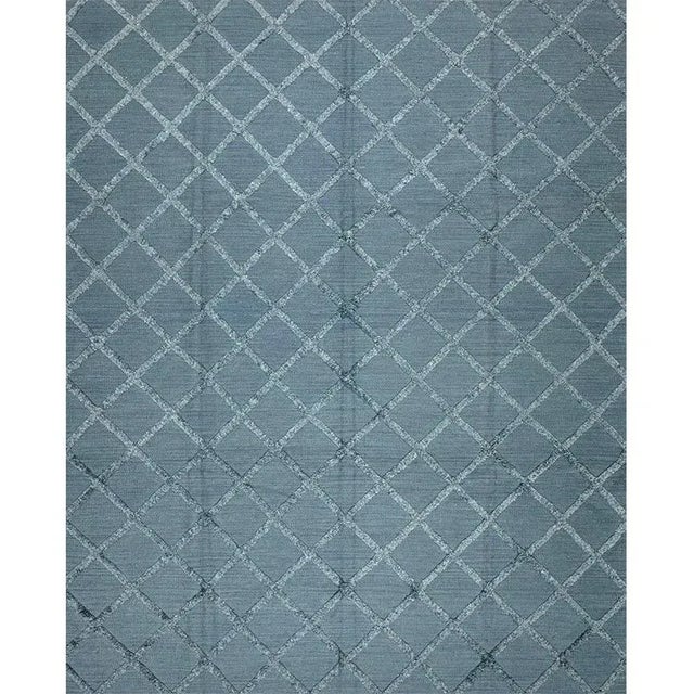 Geometric Swedish flatweave Area Rug featuring an allover design in a blue-colored field. Hand-woven with a wool pile on a...