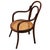 Victorian child size Thonet number 14 side chair features an elegant, sculptural frame crafted from warm-toned bentwood...