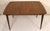 This is a stunning expanding walnut dining table by The Jefferson Wood Working Co.. This tables square shape and rounded...