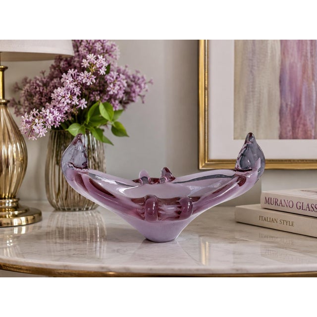A beautiful Mid-Century Italian hand-blown art glass centerpiece bowl, attributed to the Murano glassmaking tradition....