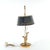 This elegant bouillotte lamp features a dark metal shade with gilt floral motifs suspended above a brass base with two...