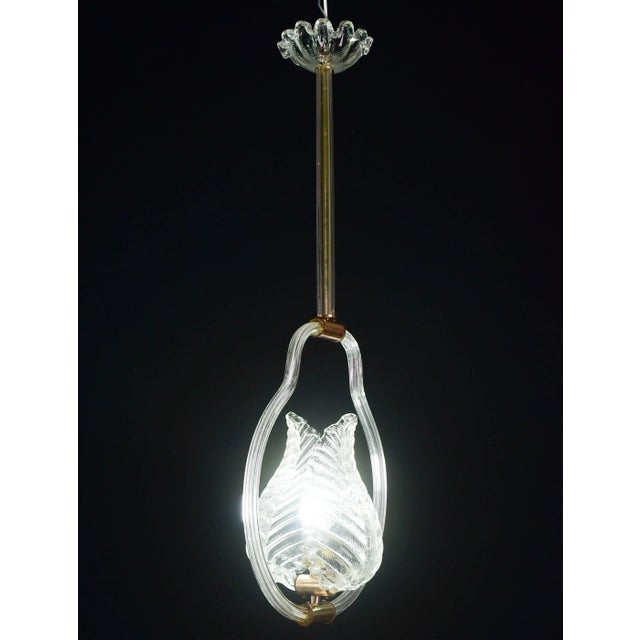 Splendid Murano chandelier made by the Barovier and Toso glassworks in the 1940s, fully restored. The chandelier measures...