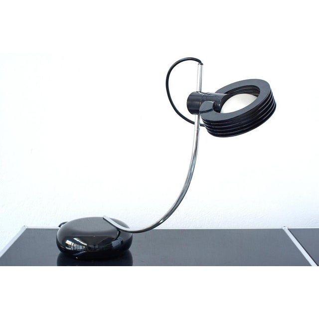 A rare and beautiful table lamp that looks like sculpture. Designed by Bruno Gecchelin in 1974 for the Italian brand...