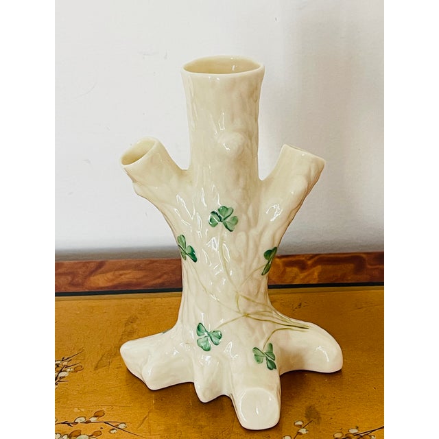 Beautiful antique Beleek Ireland porcelain 3 arm bud vase in a shape of a tree trunk , Handpainted with clove leaves.