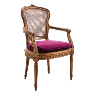 French Louis XVI Style Carved Walnut Cane Fauteuil Armchair For Sale