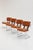 Tucroma chairs designed by Guido Faleschini for i4 Mariani. They combine a chromed metal frame with a cognac-colored...