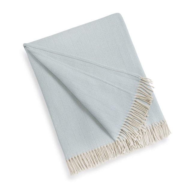 Crafted in Portugal from 100% cotton, our Madeira Throw Blanket provides a soft and comforting layer for any bed or cozy...