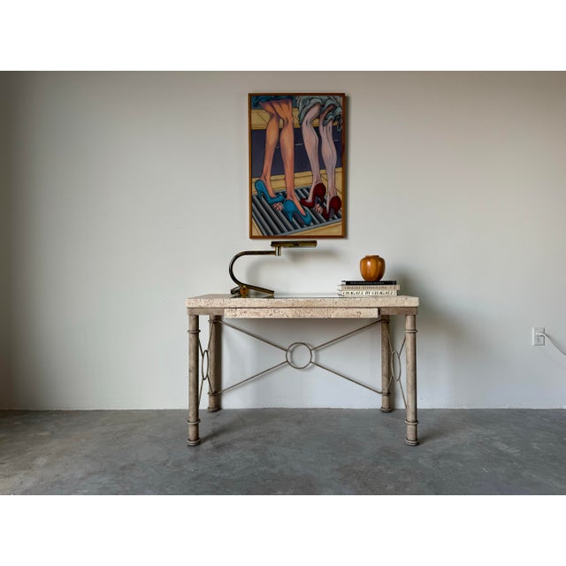 A charming Vintage faux coral stone top and metal base desk with one drawer. The Faux - coral stone top provides interest...