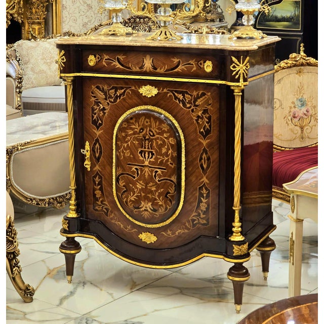 Bring timeless French sophistication into your home with this elegant French Louis XVI Accent Cabinet, masterfully...