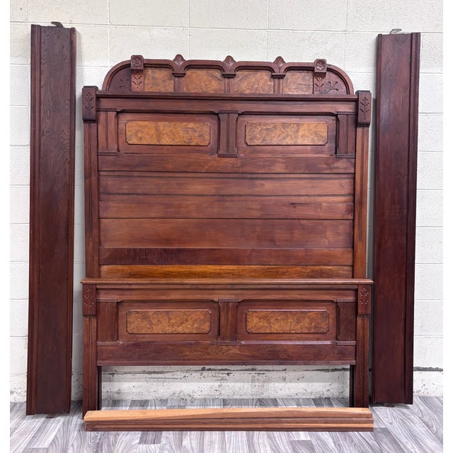 This is an impressive antique Monumental Victorian Eastlake full sized bed, circa 1880s, featuring rich walnut wood,...