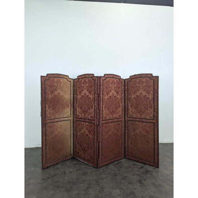 Four-Panel Screen in Red Silk with Brass Nails, in Very Good conditions. Up to 250V (Europe/UK Standard).The wiring of...
