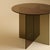 The Yuri is a bronzed glass dining table, a table scaled for a room and its company in which the material is also the...