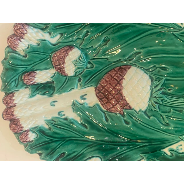 This item is an antique French Majolica Barbotine asparagus and artichoke serving platter, handcrafted by Poterie du...