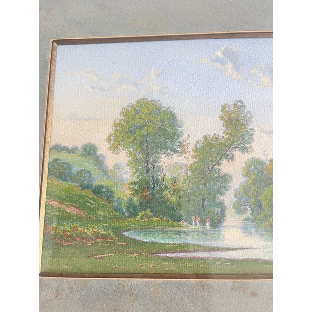 An incredibly serene and luminous late 19th-century French Impressionist landscape, masterfully executed in a delicate...