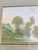 An incredibly serene and luminous late 19th-century French Impressionist landscape, masterfully executed in a delicate...