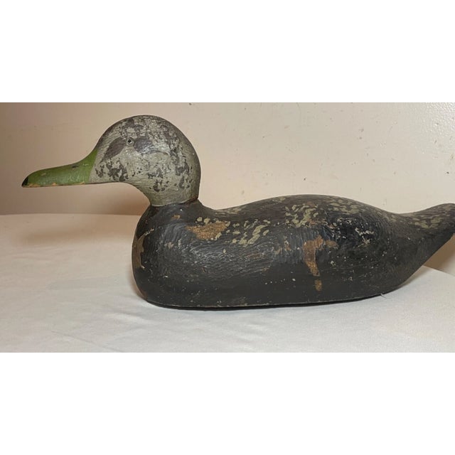 Up for sale is a wonderful antique hand carved wooden mallard decoy. It is beautifully carved with nice detailing, painted...