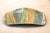 An excellent, one-of-a-kind pottery tray. Hand-made of clay in banded colors of muted green, blue and tan, it's incised...