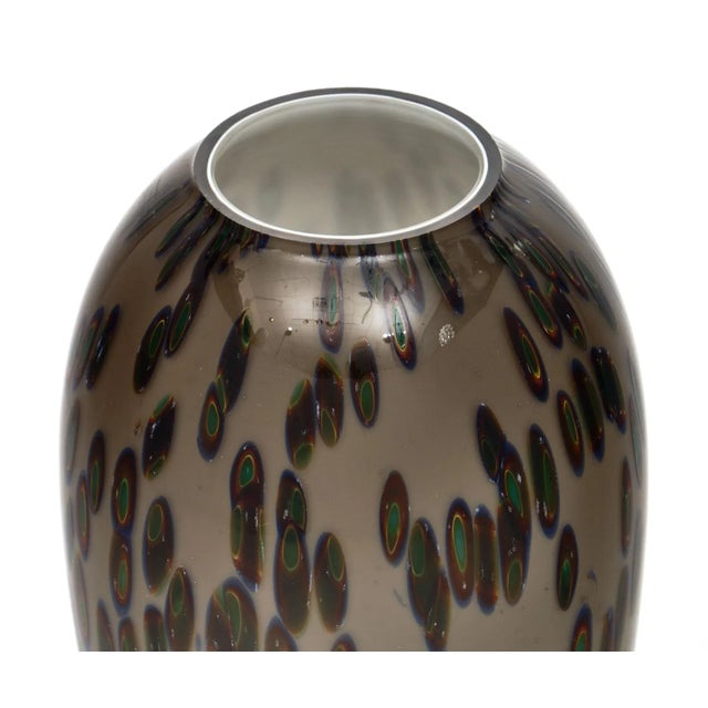 Vintage Murano glass “murrine” vase made by artisans in Italy. This hand-blown piece of art features the “murrine”...