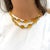 European-made two-strand necklace featuring 16 checkerboard-cut citrine beads in 18K yellow gold. Each citrine averages...