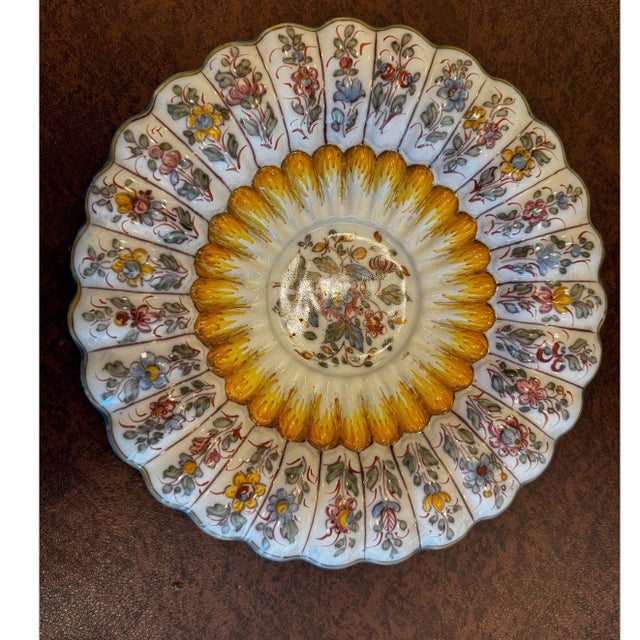 This impressive 13.5-inch charger was handcrafted in Lisbon by the renowned F.C. ConstÃ¢ncia factory. Featuring a vibrant,...