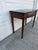 We have a beautiful vintage mahogany flip top console table for sale. It features a beautiful Federal Hepplewhite inspired...