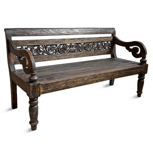 Striking vintage Balinese teak bench finished in a richly weathered blackened tone that highlights the natural grain....