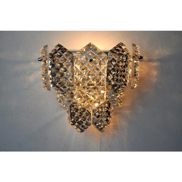 Very nice wall lamp kinkeldey dating from the 70's, designed and produced in Germany. Cut glass and chromed metal...