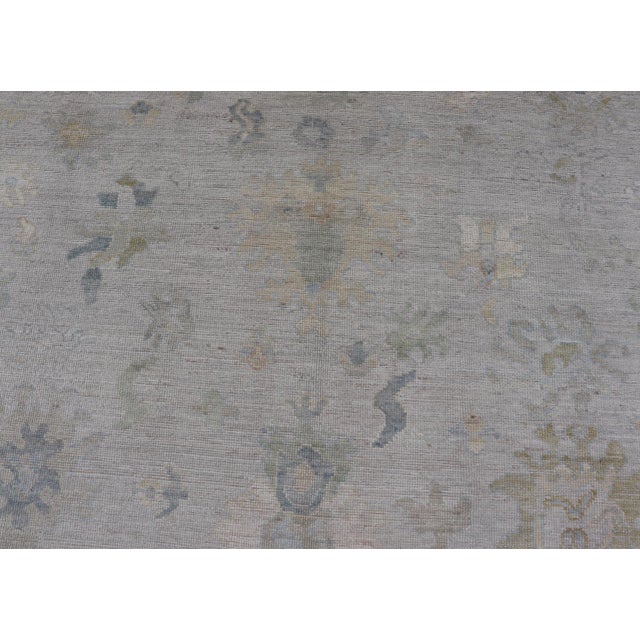 Early 21st Century Modern Tribal Oushak With a Cream Border and Light Gray-Blue Background For Sale - Image 5 of 13