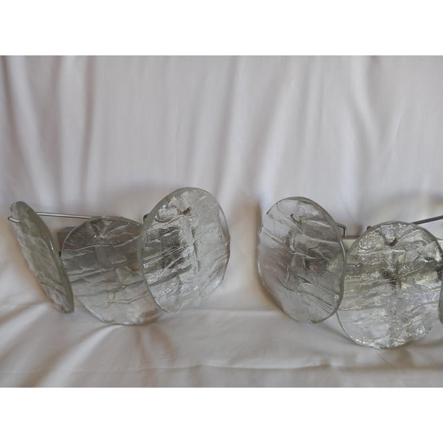 The lamps are equipped with 2x E14 sockets, fully functional, no damage whatsoever. I have official proof of authenticity...