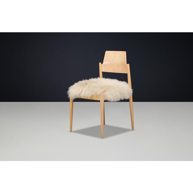 An exceptional and increasingly rare opportunity to acquire original se 119 chairs designed by celebrated german architect...
