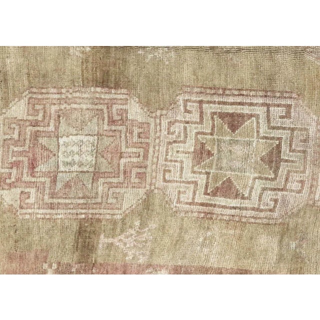 1960s Turkish Oushak Rug. Handwoven with wool on wool foundation in the Oushak region of Western Turkey. The Anatolian...