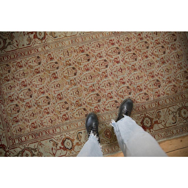 :: Allover covered field in repeating boteh design elements arranged in staggard rows wrapped by a meandering vine inner...