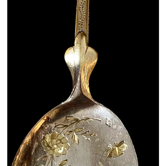An exquisite antique French set of four silver vermeil ice cream shovels/spoons in a velvet lined presentation case,...