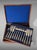 Elegant English silver-plated flatware service, comprising 12 fruit place settings (knives and forks) and 12 fish place...