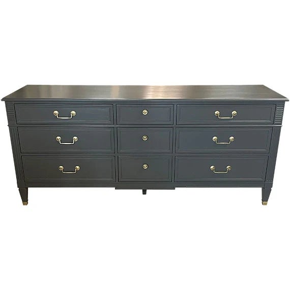 This beautifully refinished vintage dresser offers timeless style with exceptional storage. Featuring a classic nine-...