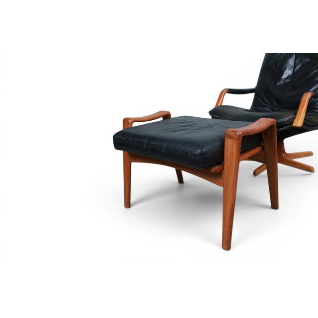 Mid-Century Modern Arne Wahl Iversen Highback Swivel Chair and Ottoman in Black Leather + Teak For Sale - Image 3 of 8