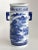 A graceful vintage Chinese blue and white porcelain vase featuring a serene hand-painted landscape scene in rich cobalt...