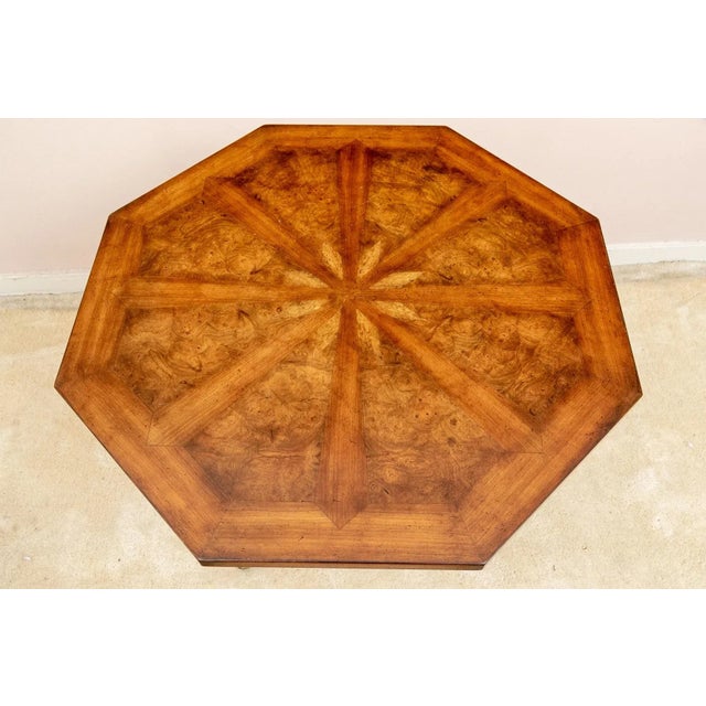 Early 20th century octagonal top side table with a finely figured walnut burled parquetry panels in a banded starburst...