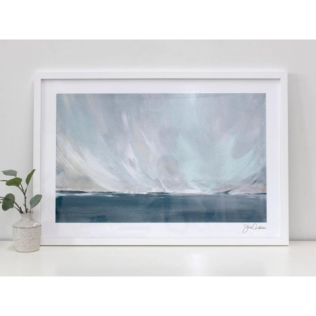 A dreamy landscape with soft blue tones warmed with purple and neutral accents. This archival fine art matte print has a...