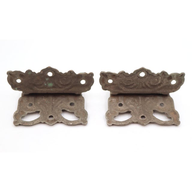 Antique Art Deco style spring door hinges made of brass with a nickel finish. The original mounting screws are not...