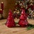 Infuse your holiday décor with bold, festive shine using this set of two red mercury glass Christmas trees, designed to...