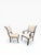 A refined set of ten dining chairs by Kindel Furniture Company, showcasing elegant neoclassical styling with sculptural...
