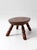 A charming vintage Early American wood footstool featuring classic turned legs and a beautifully aged patina. The oval top...