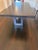 Dakota Jackson grand dining table. Ebonized maple wood. Made to order for this space. In good condition. Comes with 2...