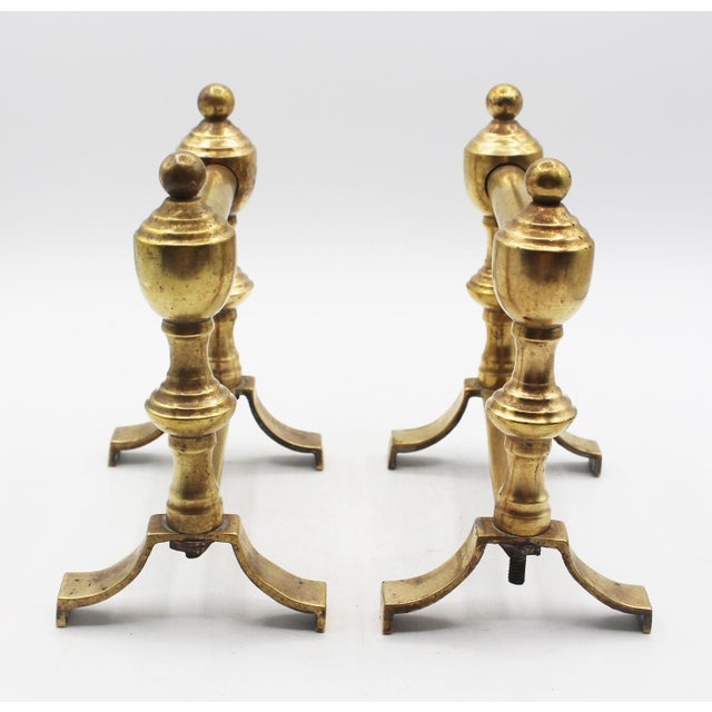 Pair of Georgian Revival brass tool rests, English, early 20th century. Edwardian period. Note how they pick up design...