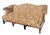 Antique Chippendale-Style Camelback Sofa -The antique couch features a classic design with ornate upholstery,...