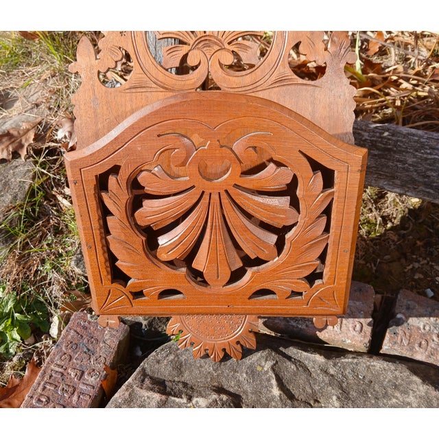 Antique Victorian Walnut Pierce Cut Carved Magazine Rack Wall Mount 1900s An antique Victorian solid walnut magazine rack...
