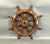 Eight spoke ships wheel with solid brass – Lannan Gallery with brass hub and trim ring. Eight turned posts are fitted to a...